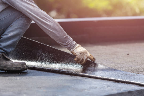 Professional Basement Waterproofing technician working in Galesville, MD